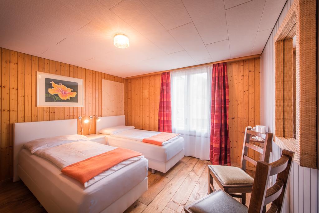 Hotel Tell And Apartments Unterseen Quarto foto